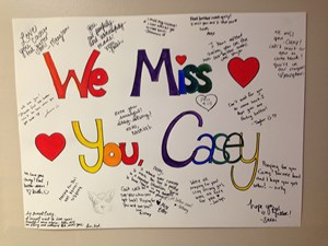 Dorm room poster: We miss you Casey