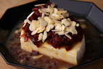 Baked Brie with Orange Maple Craisin Sauce