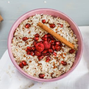 A bowl of quinoa with fruit.