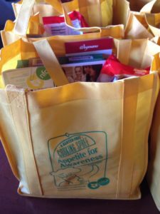 Goodie bags with food samples and informational pamphlets. 