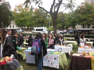 Attendees look at booths at the gluten-free awareness carnival.