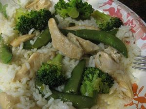 The chicken, rice, broccoli dish on a plate.