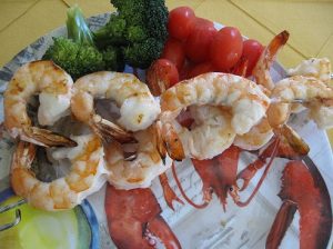 Jumbo shrimp next to other ingredients.