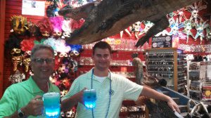 Dave and Cole are drinking bright blue drinks.
