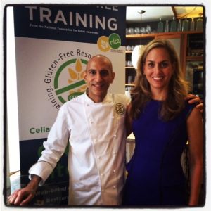 Chef Mehta standing with Alice Bast.