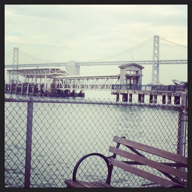 A view of the Bay Bridge. It's a foggy day.