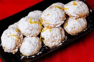 A plate of lemon snowball cookies.
