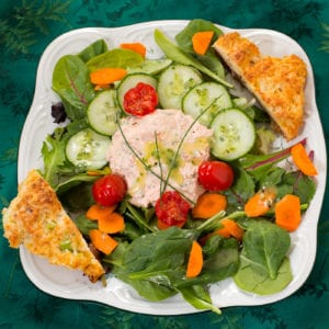 Salmon pate on a bed of salad.
