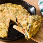 A crustless quiche, ie frittata, still in the pan.