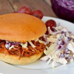 A pulled pork sandwich with coleslaw