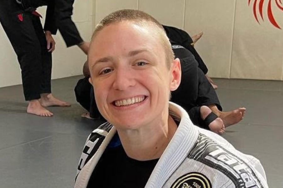 A photo of Hayden smiling in a jiu jitsu dojo. 