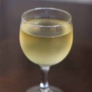 A glass of pinot grigio.
