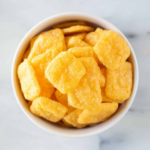 A bowl of cheese crackers. 