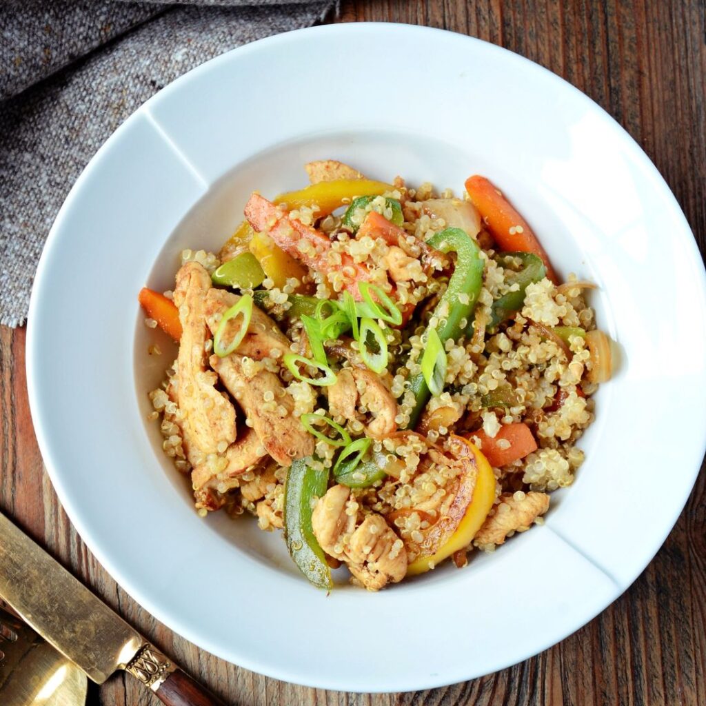 A bowl of quinoa stir fry. 