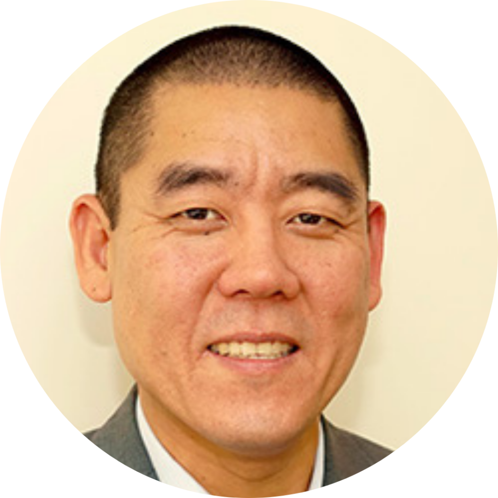 A headshot of Arnold Han.