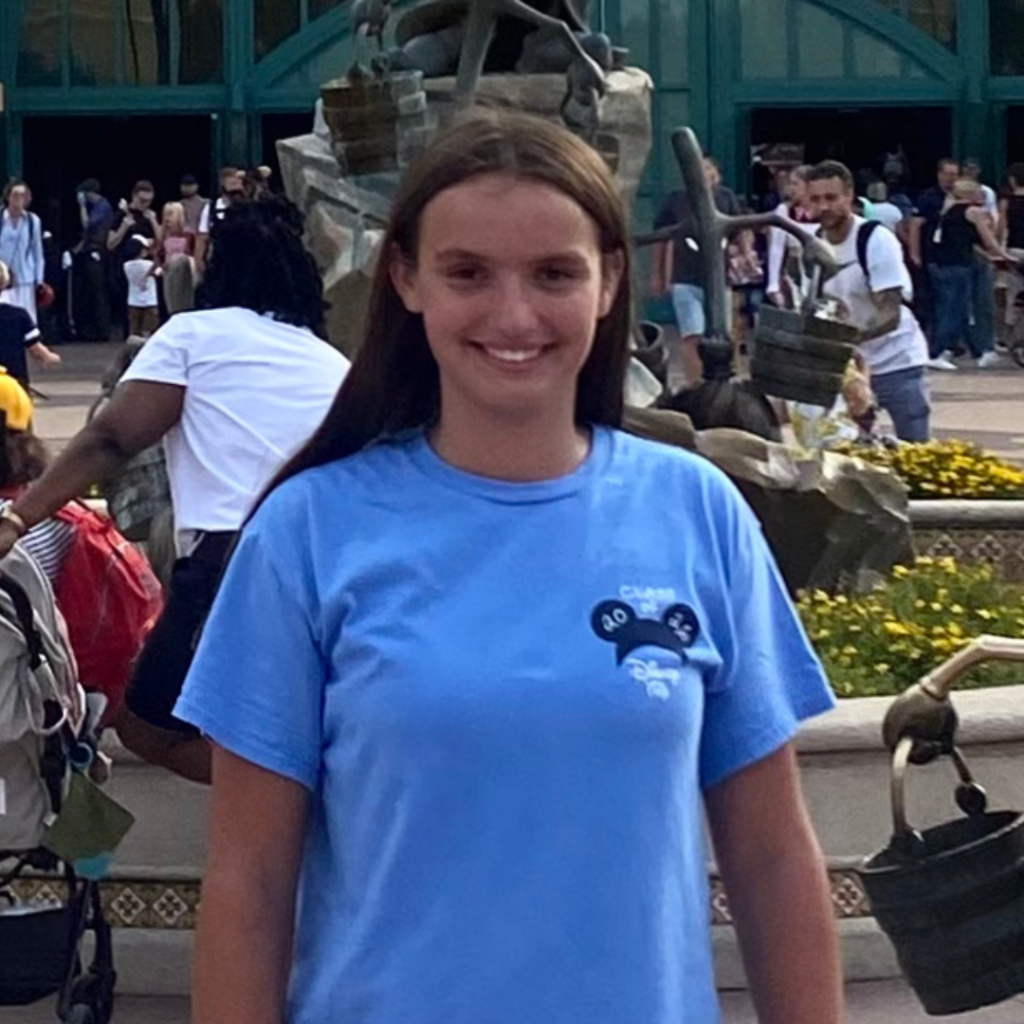 Claire in a blue shirt