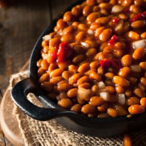 A casserole pot of baked beans.
