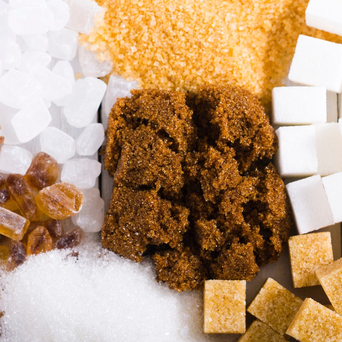 Piles of various sugars.