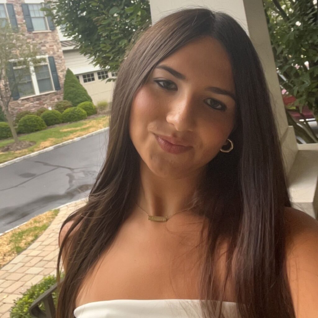 A photo of Hannah smiling.