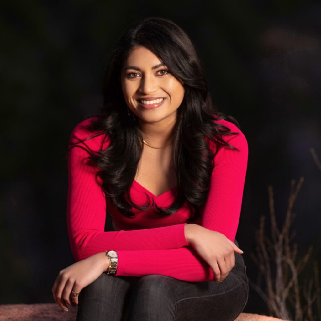 A photo of Parnika smiling.