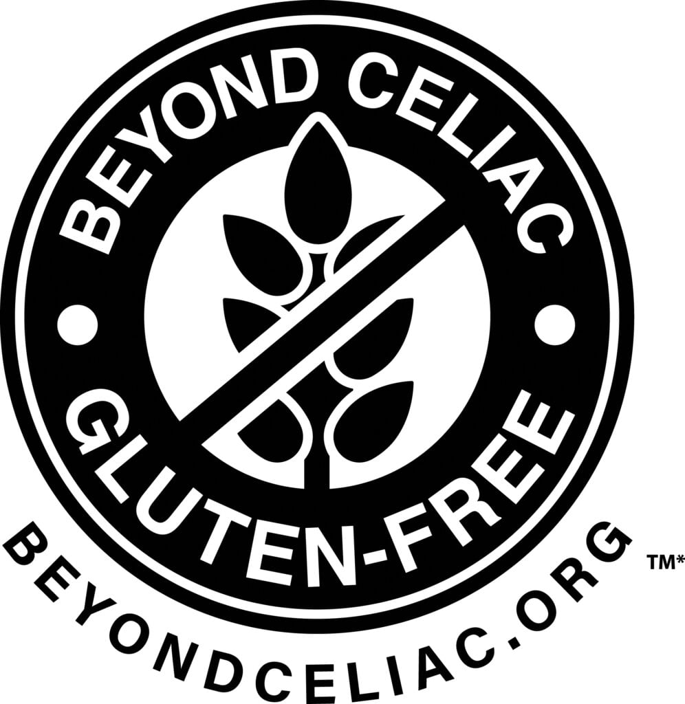 A circular black and white logo reads Beyond Celiac Gluten-Free, highlighting celiac disease food safety with a crossed-out wheat symbol in the center. The website beyondceliac.org is written at the bottom edge.