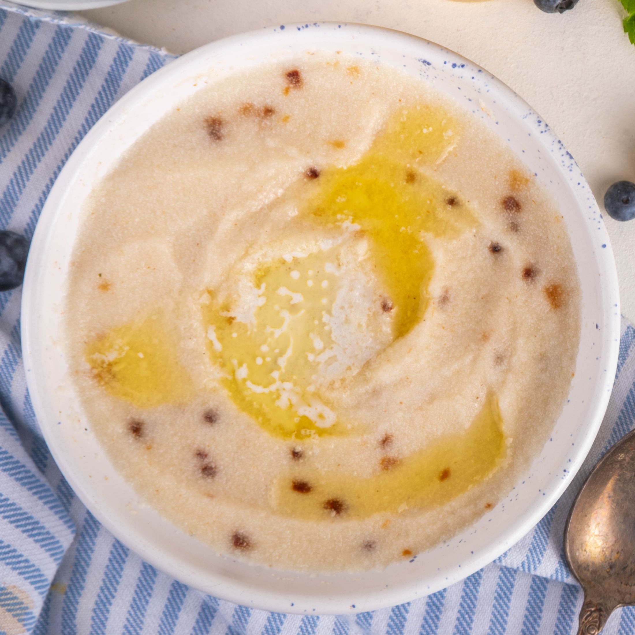 A bowl of farina with honey.
