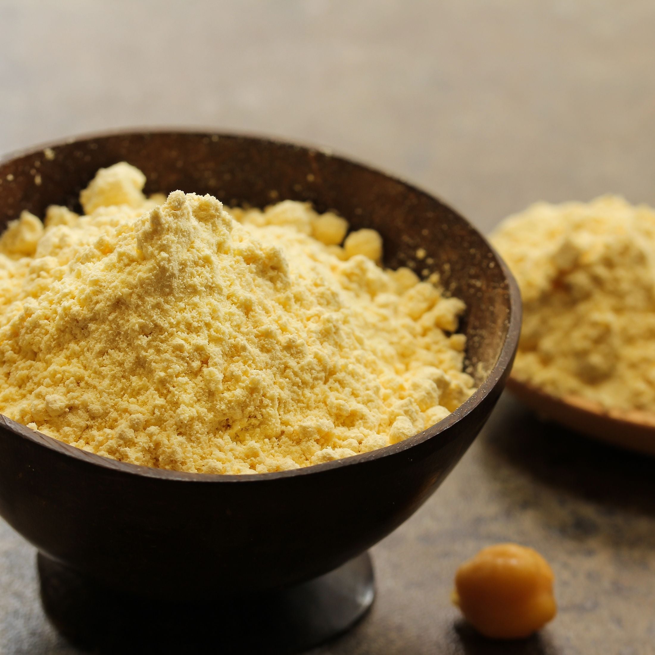 A bowl of gram (chickpea) flour.