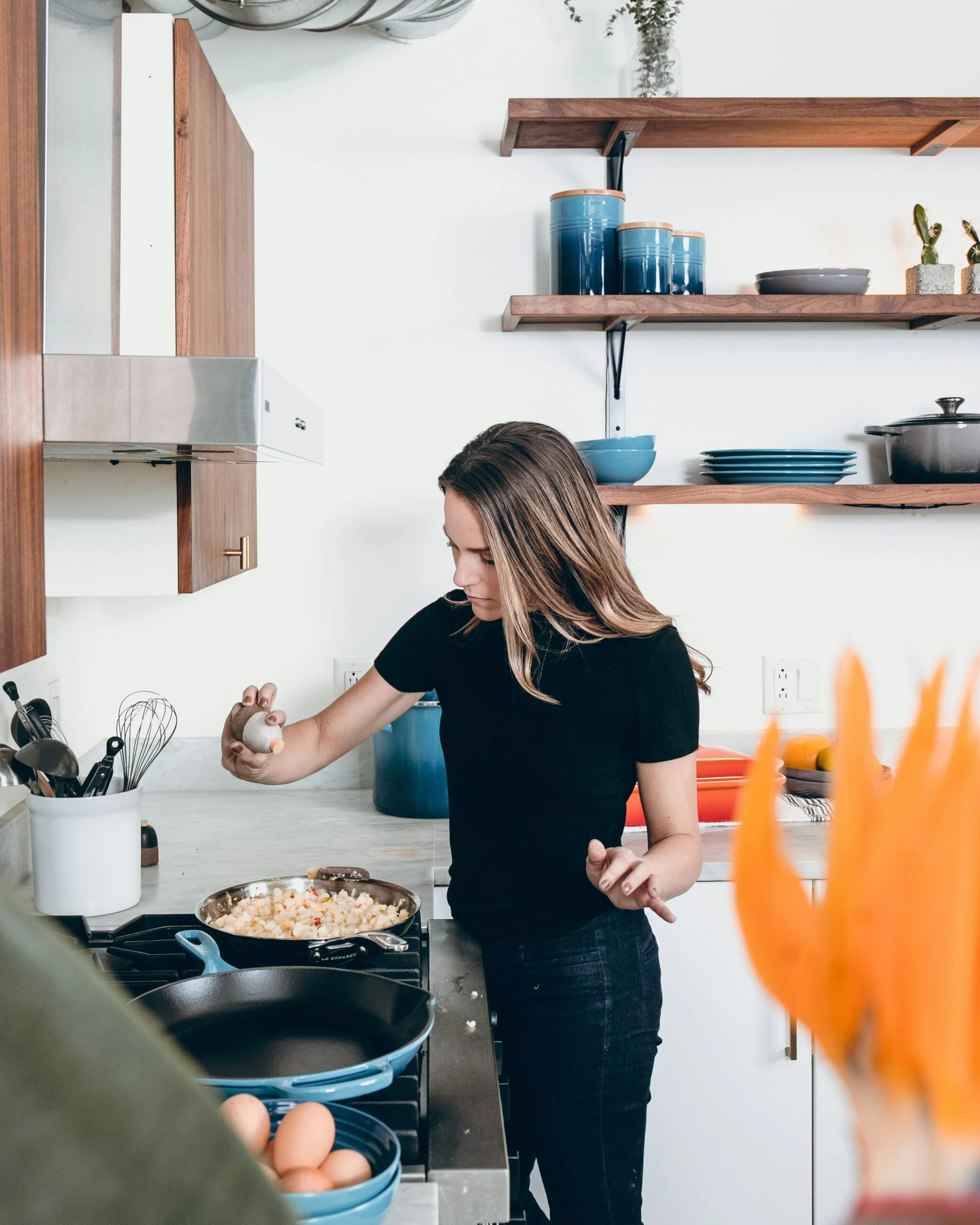 A woman cooking.