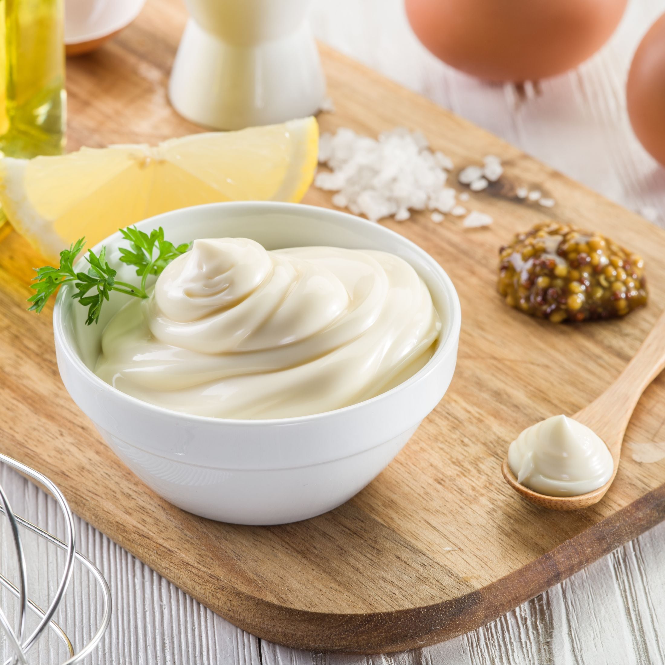 A bowl of mayonnaise.