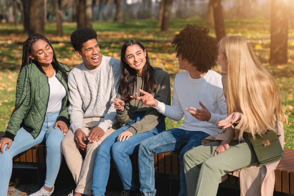 A group of friends chatting outside.