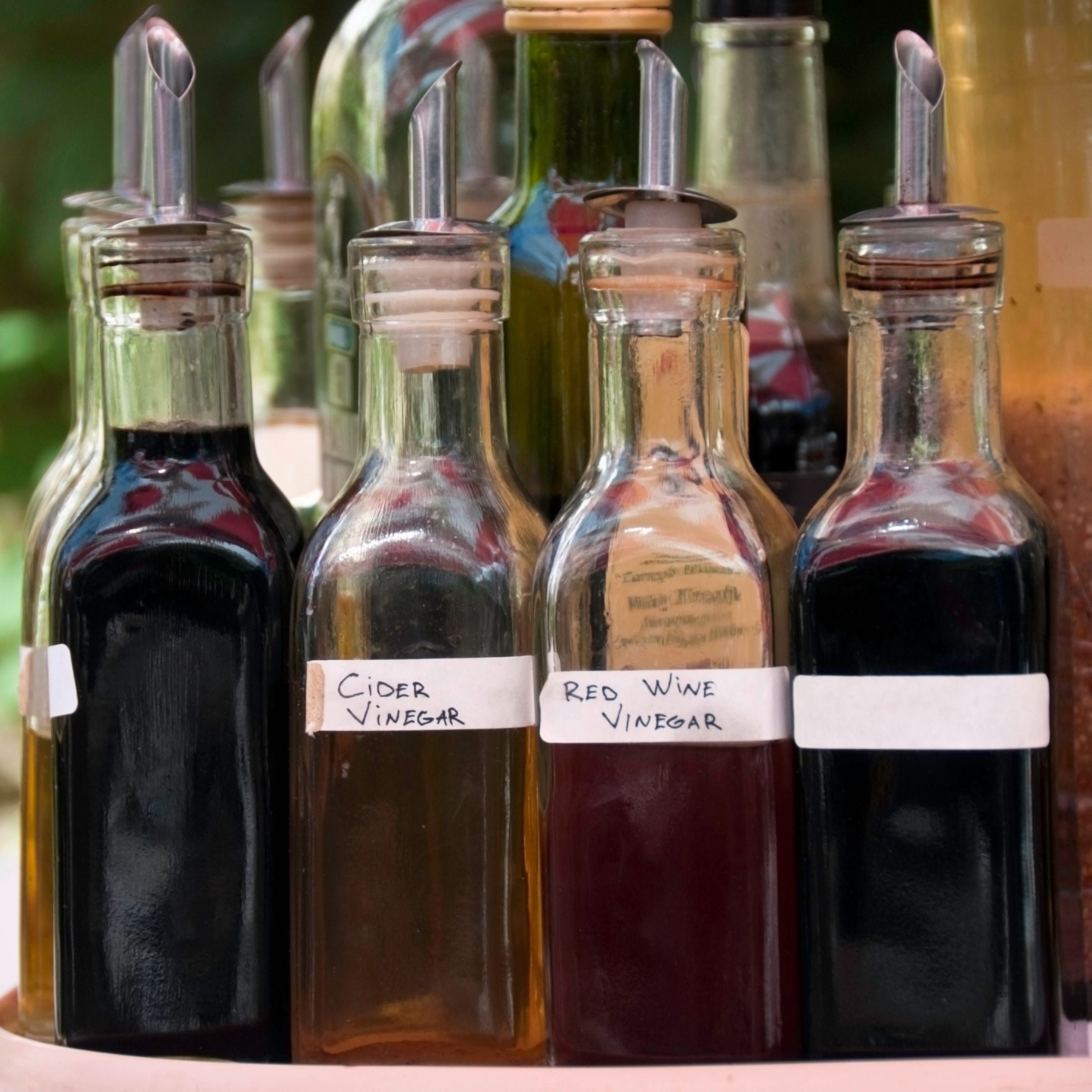 Bottles of various vinegars.